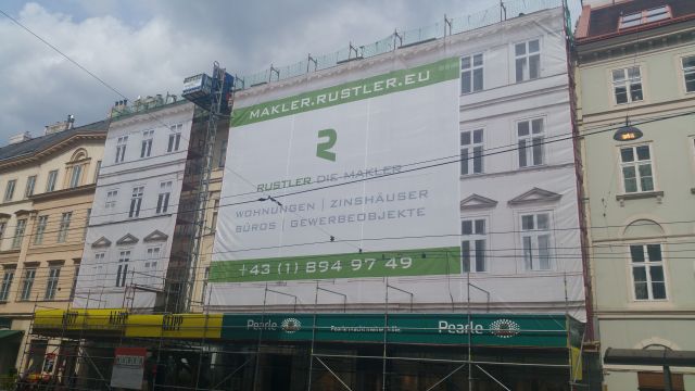 Fassadengerüst-Verkleidung Druck und Montage – Referenz AbdeX
